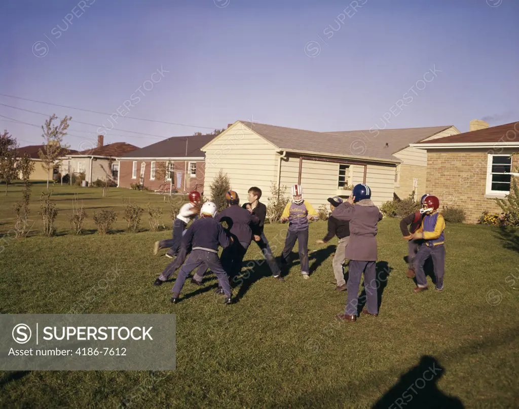 1950S 1960S Group Neighborhood Boys Play Touch Football Backyard Suburban Houses