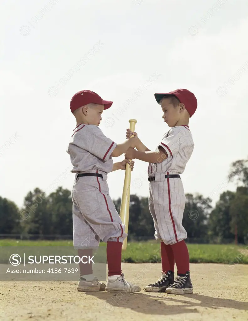1960S Two Boys Holding Baseball Bat Youth League Uniforms
