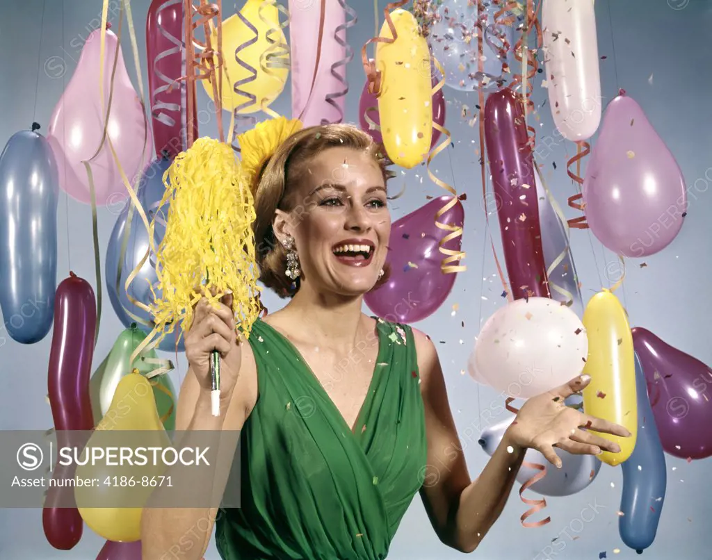 1960S Smiling Laughing Blond Woman Celebrating New Year Party Amid Balloons Streamers Confetti