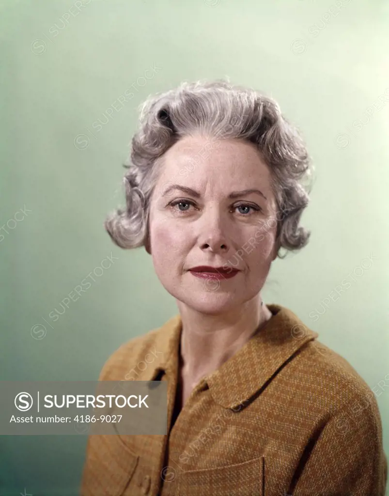 1960S Elderly Mature Senior Woman Portrait Unsmiling Serious Expression Orange Tweed Jacket Retro Women