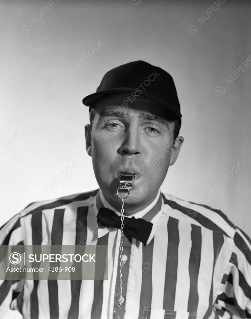 1950S Football Referee Blowing Whistle