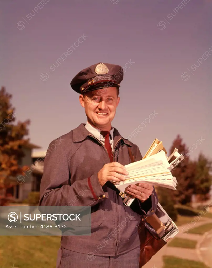 1960S Smiling Mailman Holding Letters Mail Leather Mailbag In Suburban Neighborhood 