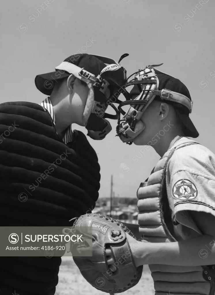 1950S Boys In Baseball Uniforms Face To Face Arguing Umpire & Catcher