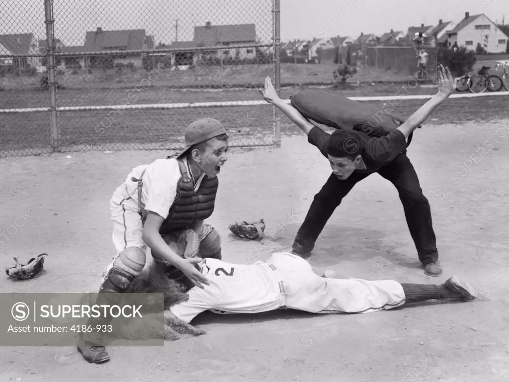 1950S Youth League Umpire Calling Safe Player Sliding Into Home Plate