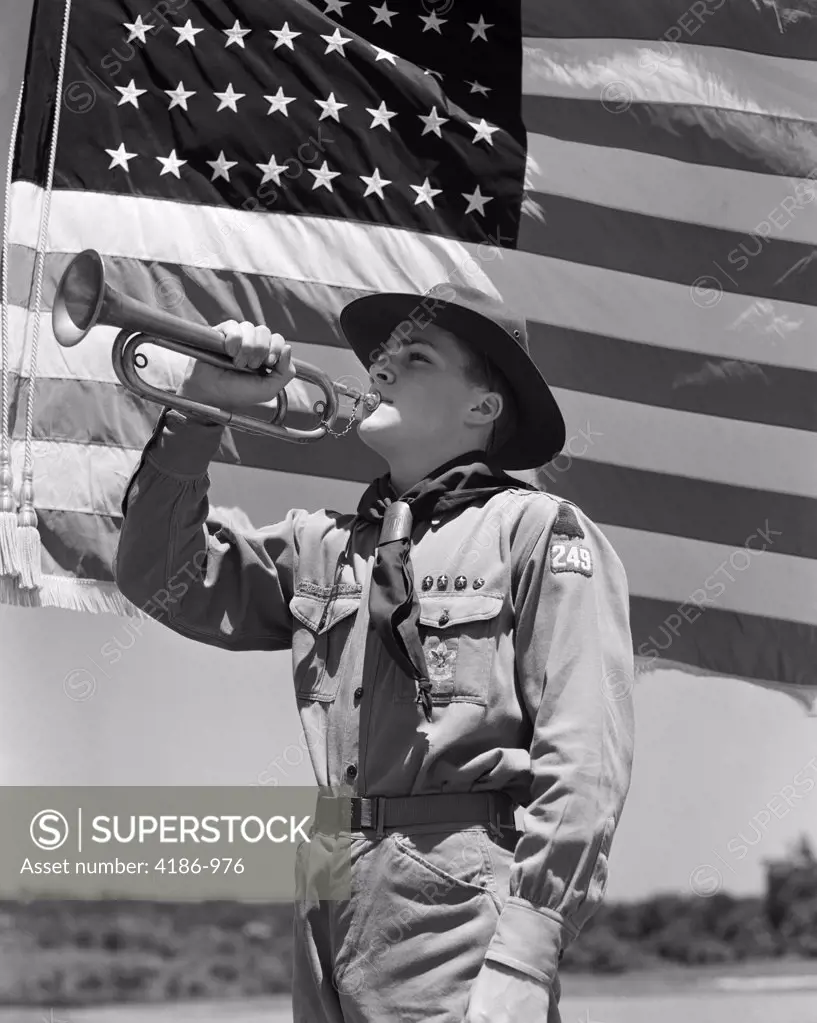 1940S Boy Scout Playing Bugle Flag American