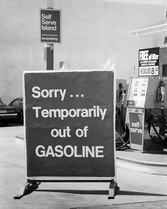 1970s CLOSE-UP SORRY TEMPORARILY OUT OF GASOLINE SIGN AT SELF SERVICE GAS STATION DURING 1973 OPEC OIL SHORTAGE CRISIS