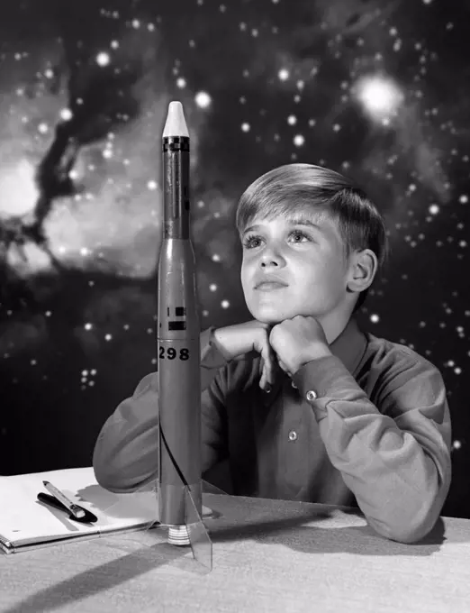 1960S Boy With Model Rocket And Outer Space Background