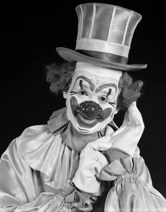 1950S Portrait Of Clown Wearing Top Hat Smiling Indoor