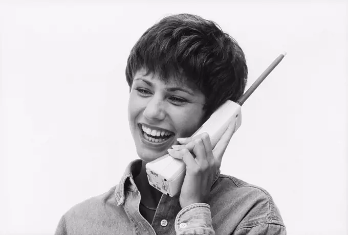 1990S Smiling Woman Talking On Cordless Telephone