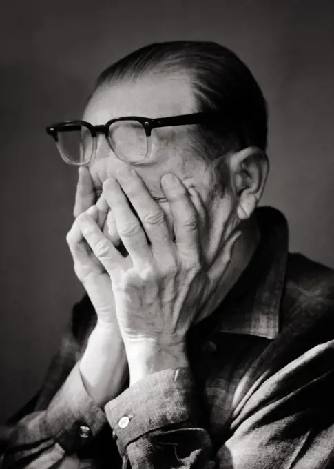 1970s PORTRAIT MATURE MAN HANDS COVERING FACE EYEGLASSES PUSHED UP ONTO FOREHEAD OVERWHELMED TIRED EXHAUSTED DEPRESSED