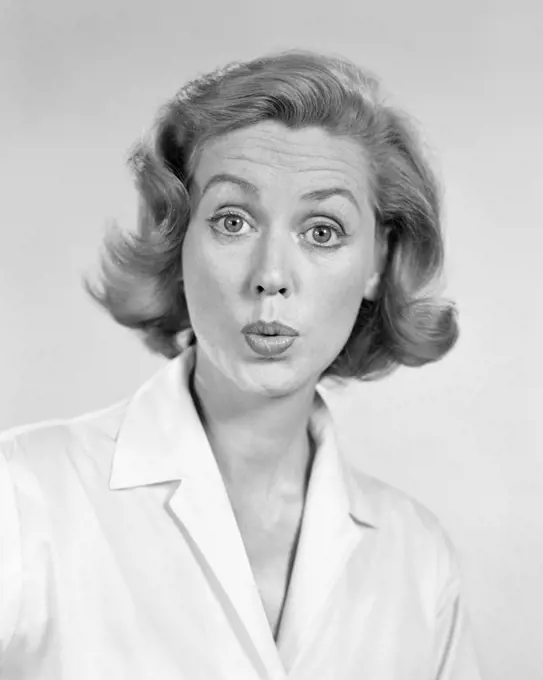 1950s 1960s PORTRAIT WOMAN WITH SHOCKED SURPRISED FACIAL EXPRESSION
