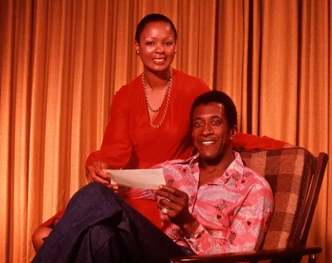 1970S African American Couple Smiling Holding Check