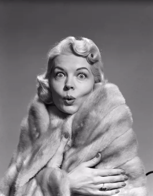 1950S Woman Wrapped In Fur Stole Making Funny Facial Expression
