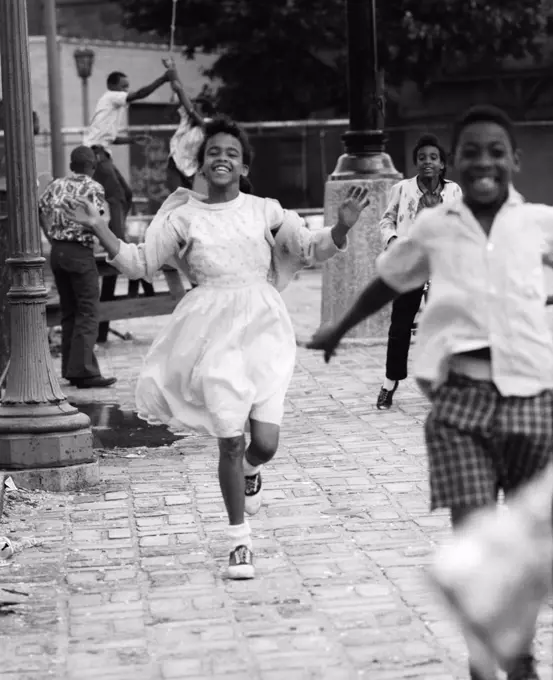 1970S Group Of African American Children Running Down Sidewalk