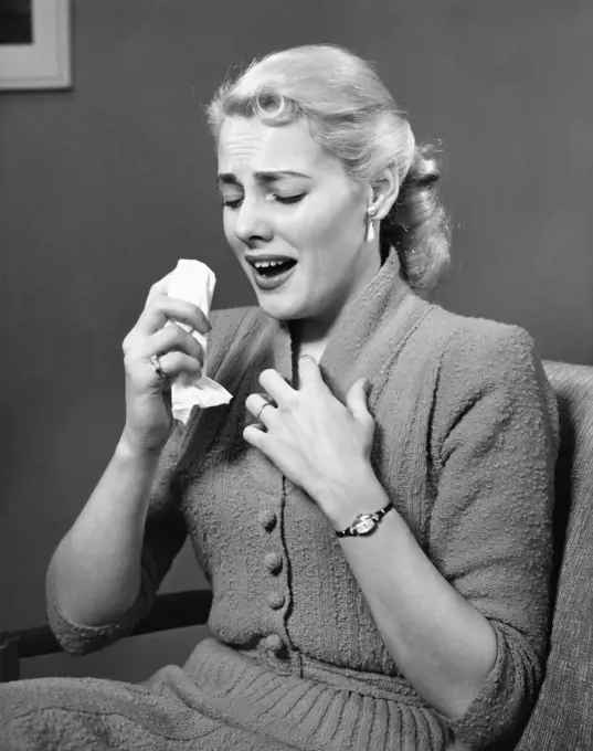 1950S Blond Woman Sneezing Holding Handkerchief