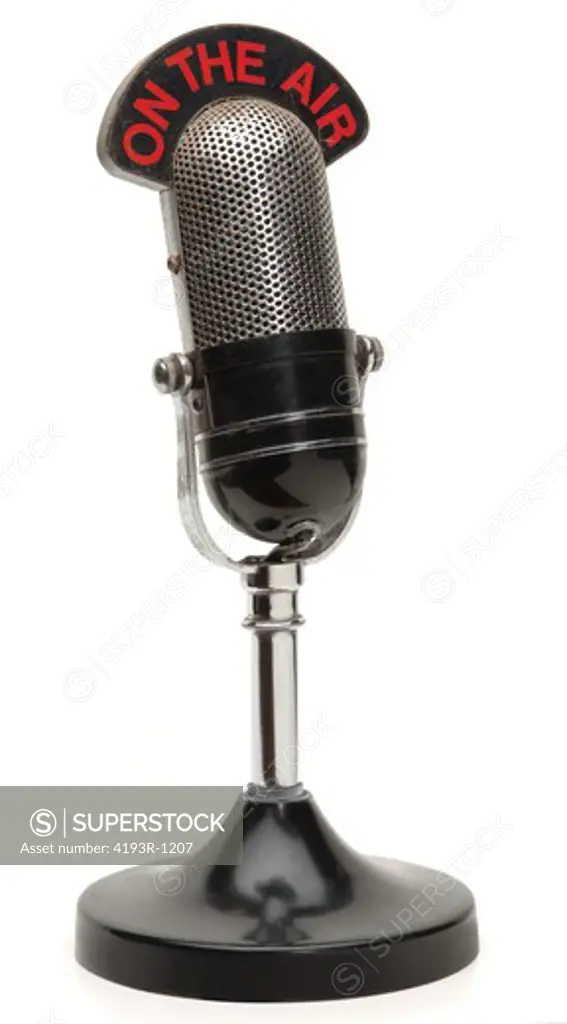 old broadcast microphone on white background