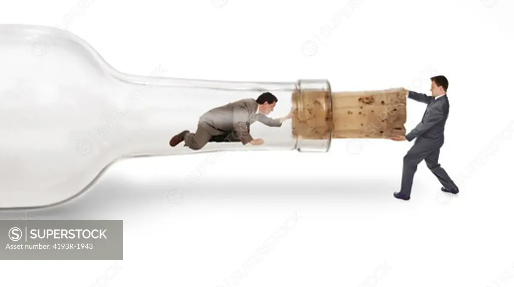 A businessman trapped inside a bottle trying to crawl out through the neck with his partner pulling on the cork from the outside