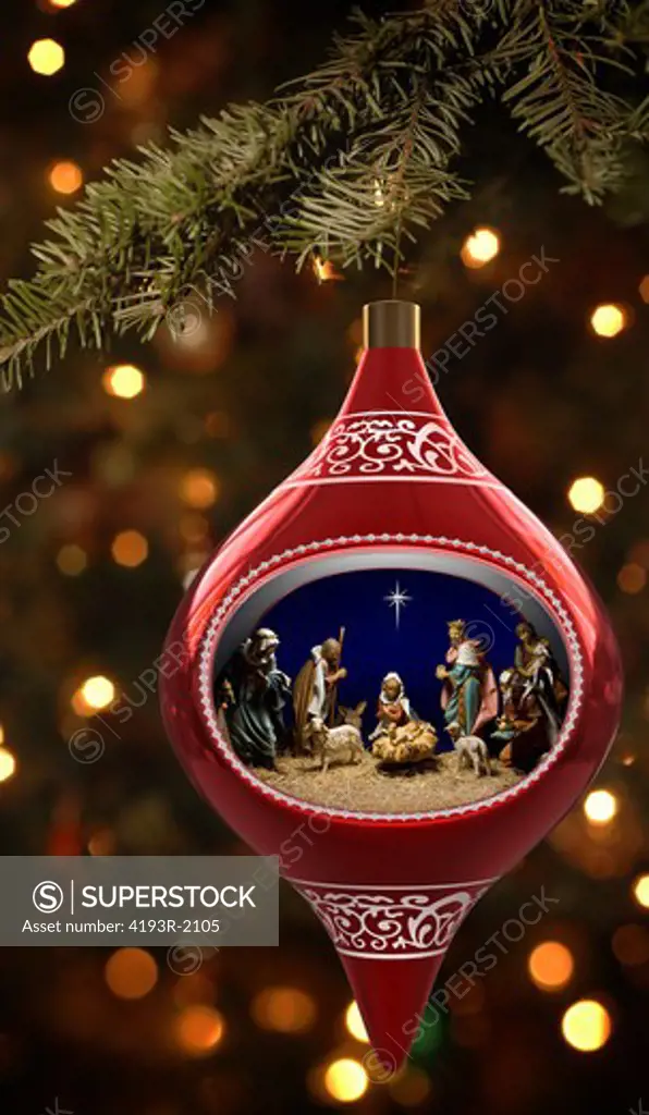Christmas ornament featuiring a diorama of the nativity