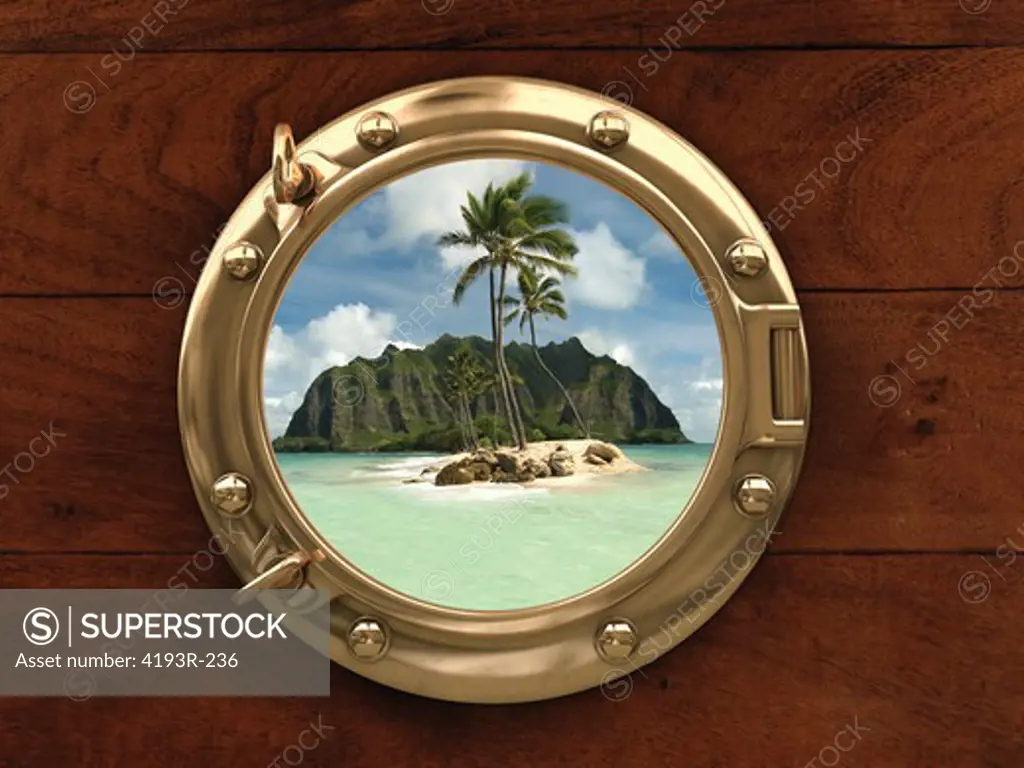 Porthole inside a ship with a view of a deserted island