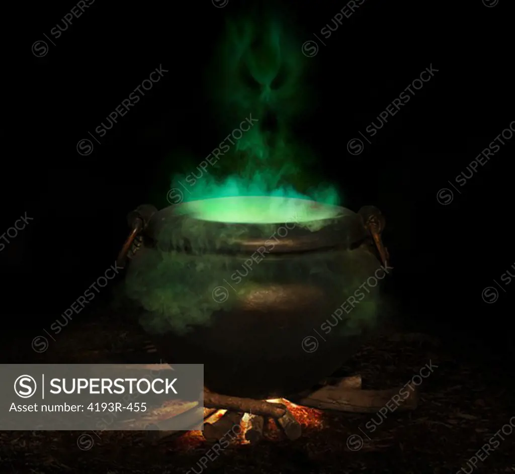 bubbling iron cauldron with green smoke and evil spirit rising