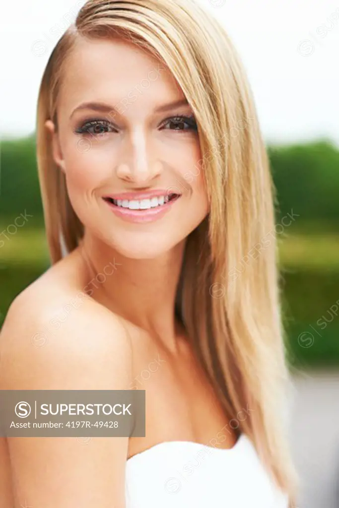 Closeup portrait of a stunning young woman with a dazzling, white smile