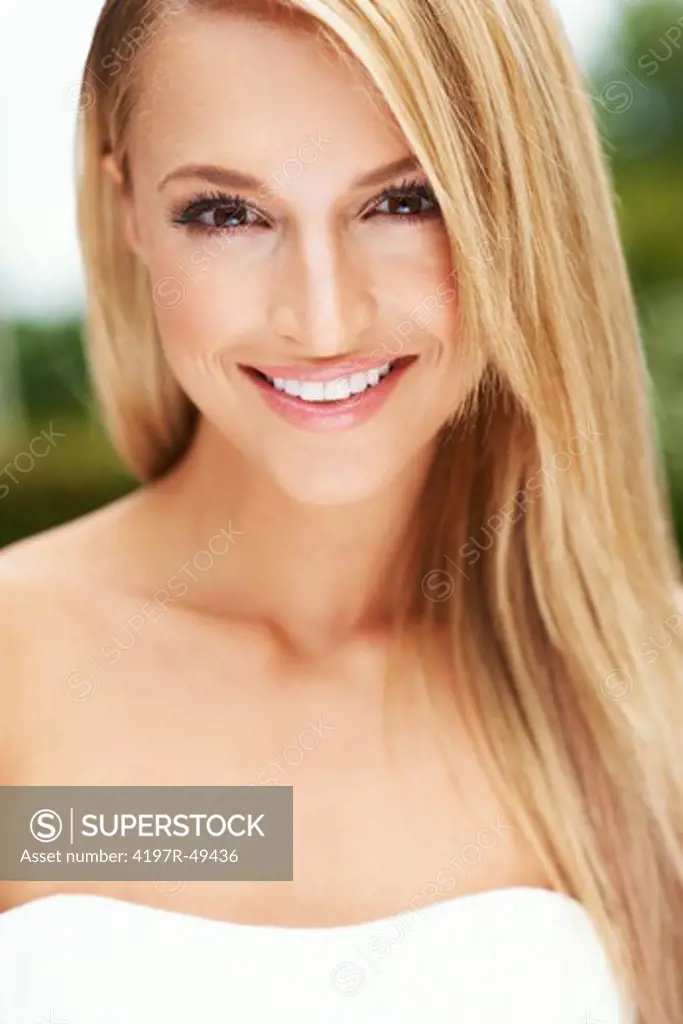 Closeup portrait of a stunning young woman with a dazzling smile