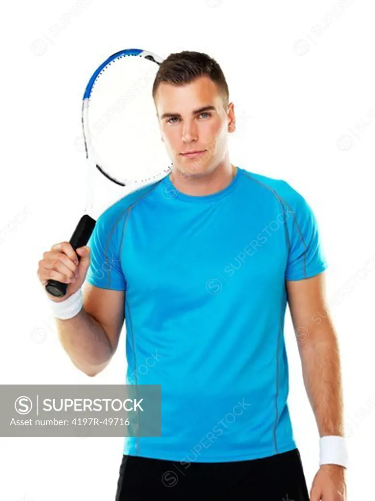 Portrait of a young male tennis player holding his racquet over his shoulder
