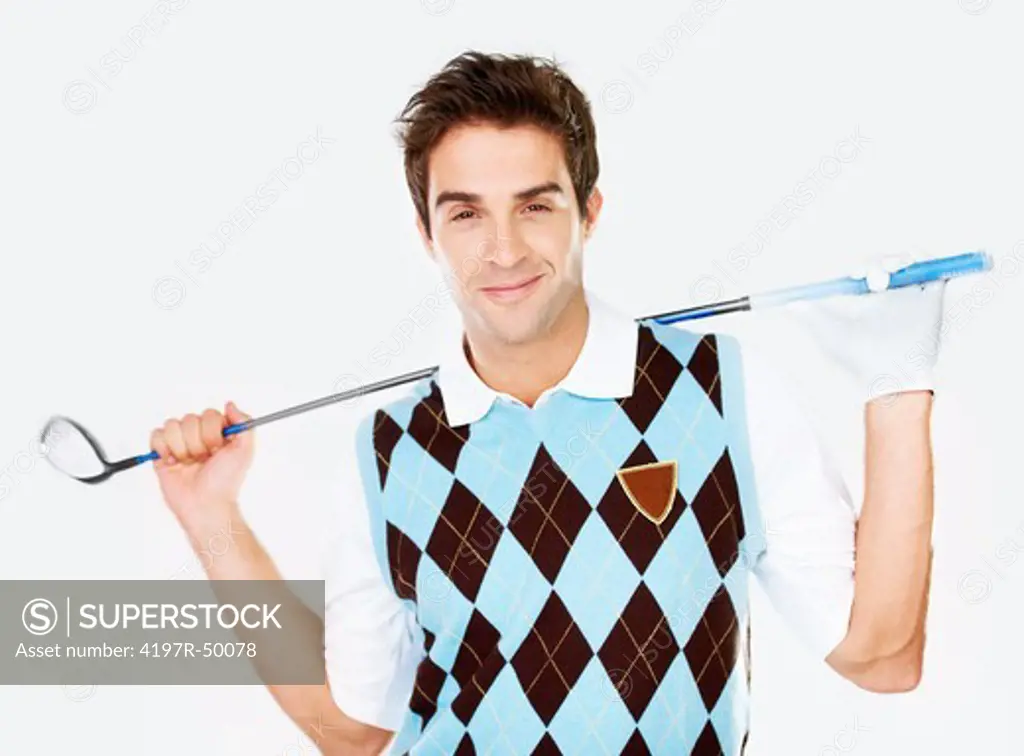 Proud young golfer holding his club while isolated on white