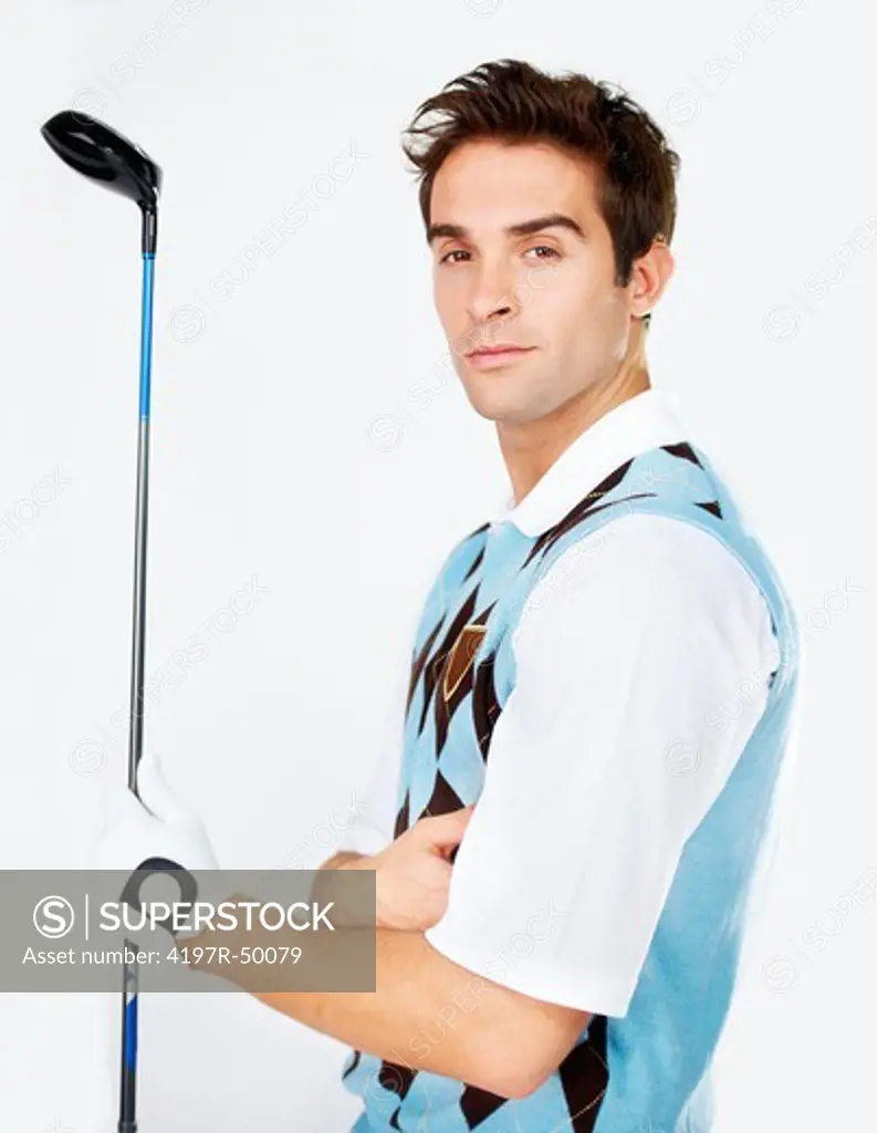 Handsome young golfer isolated on white while holding his club