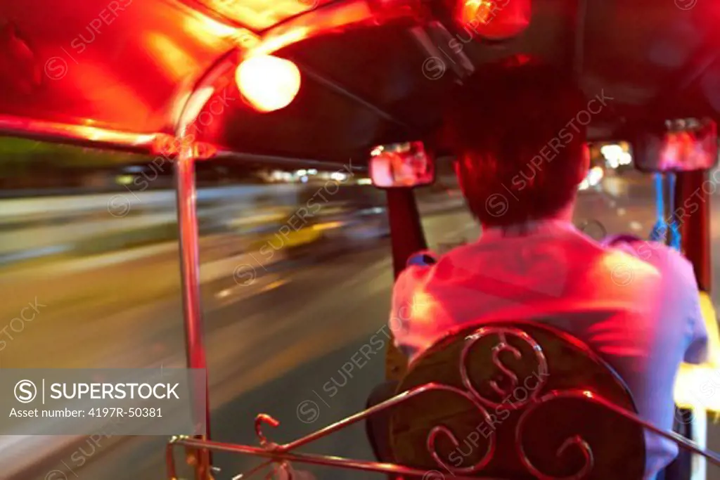 Traveling in a tuk-tuk taxi in Bangkok