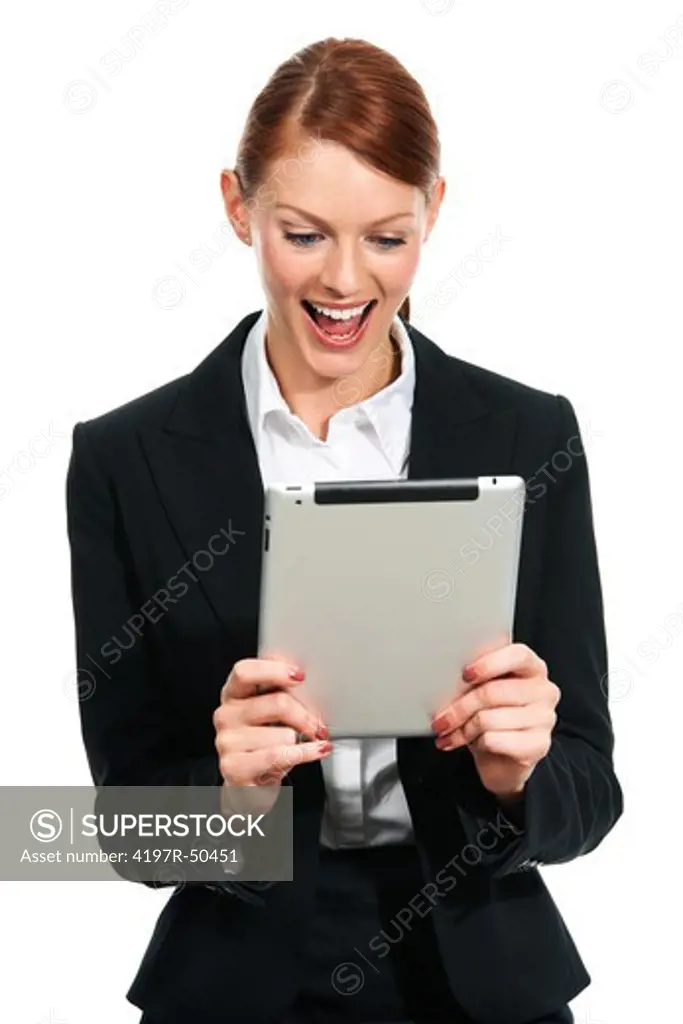 A young executive finding something pleasing on her digital tablet