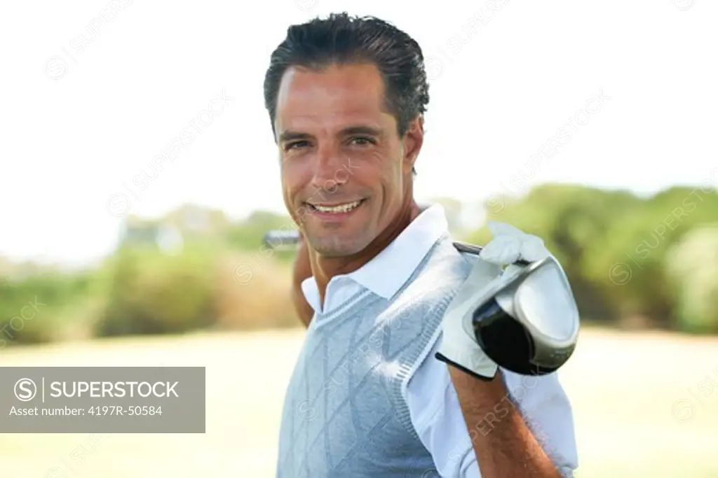 Portrait of a smiling and confident mature golfer feeling great