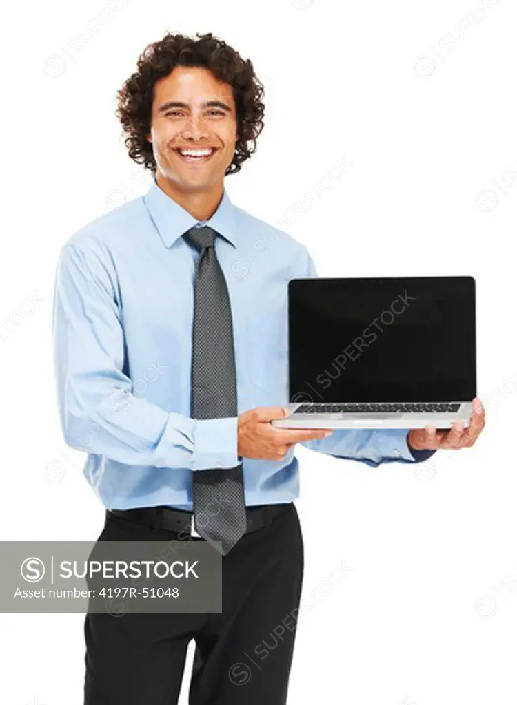 Portrait of a young businessman holding a laptop on a white background