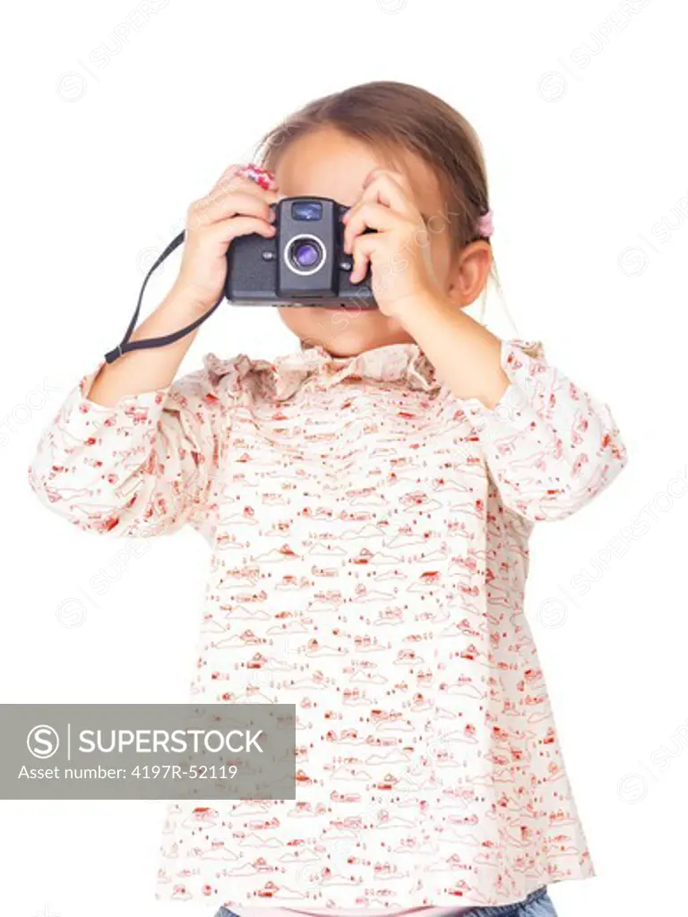 Pretty little girl shooting with camera over white background