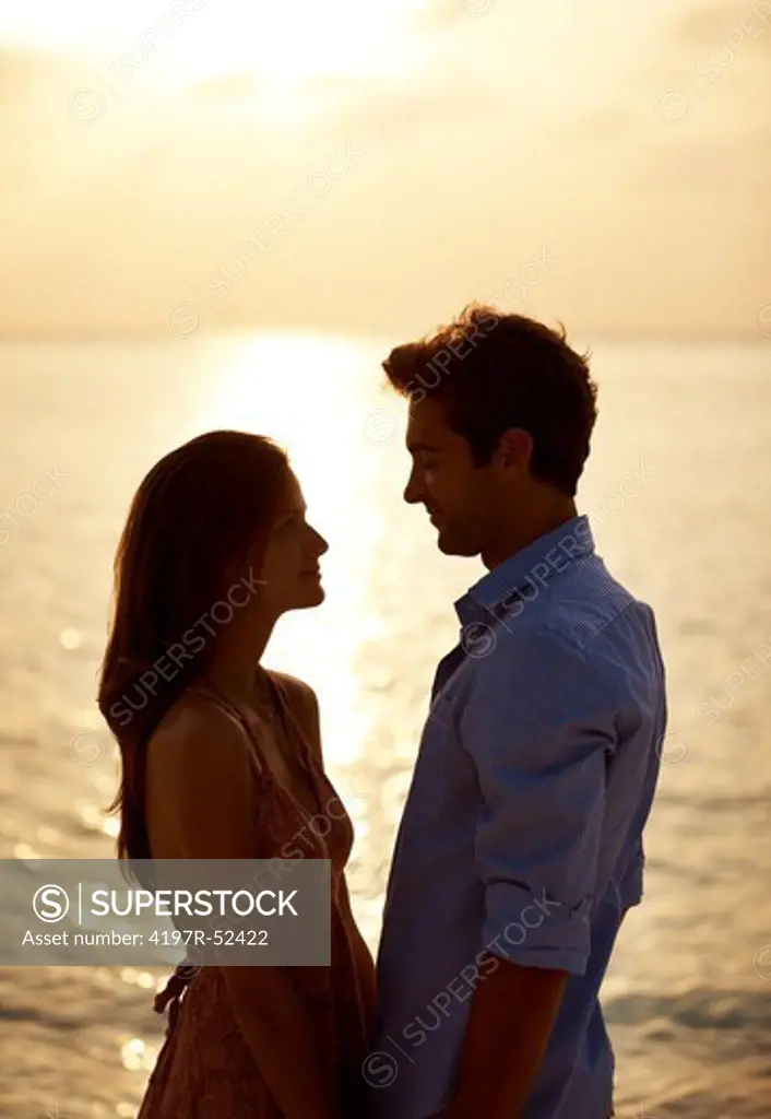 Romantic young couple in love at sunset - Enjoying vacations