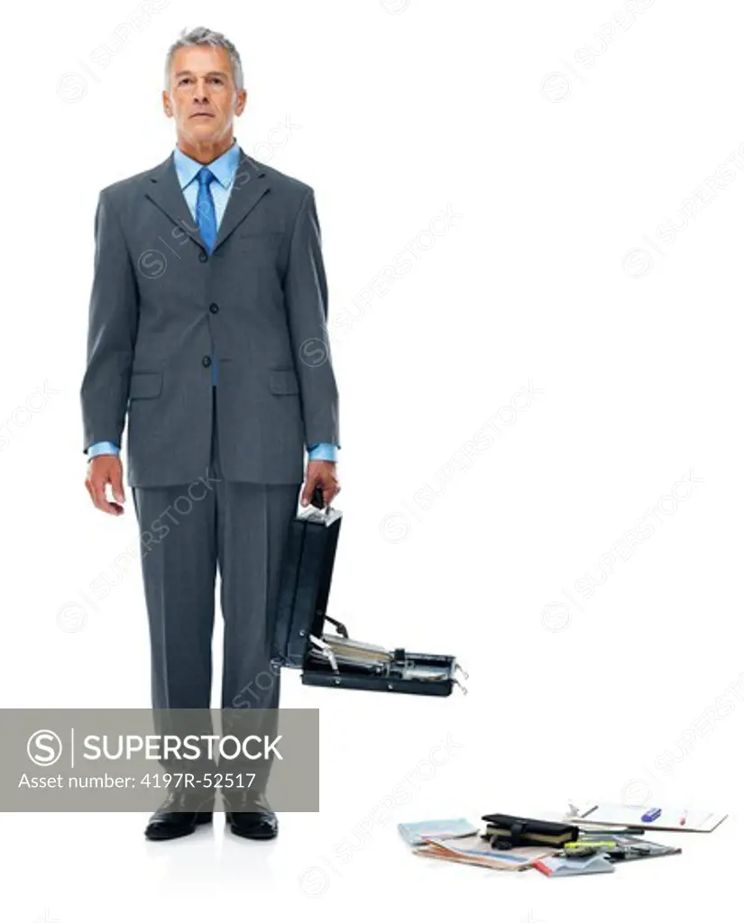 Elderly businessman holding open suitcase with papers falling down on white background