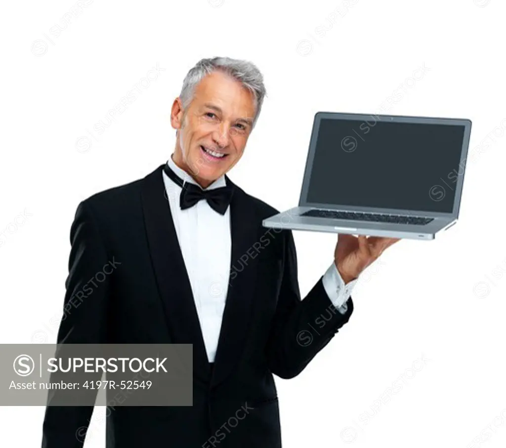 Portrait of handsome male executive displaying a laptop computer over white background