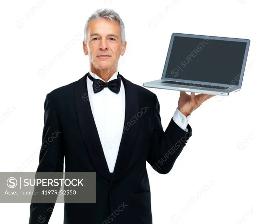Portrait of a mature business man displaying a computer laptop over white background