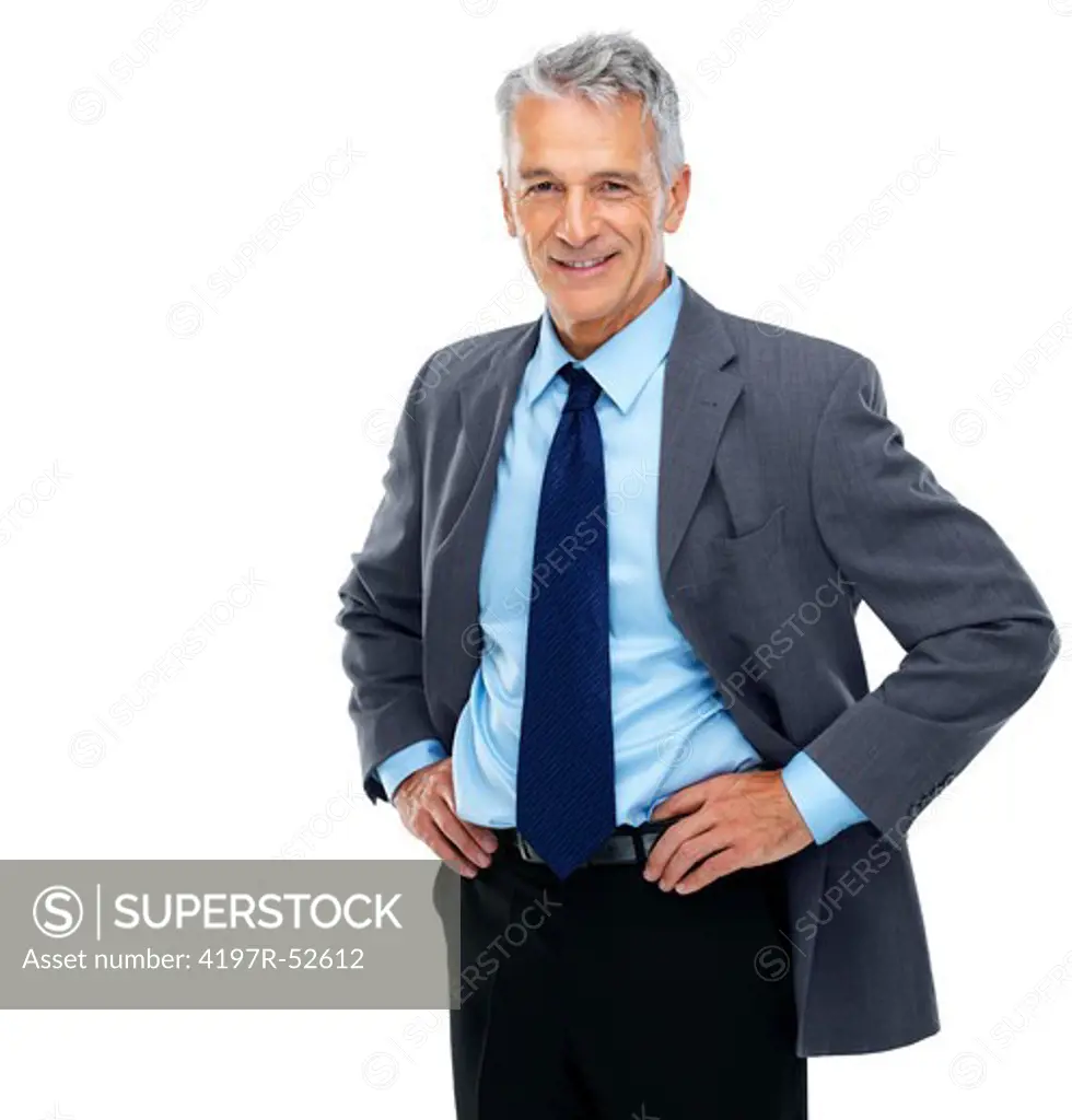 Portrait of a happy business man standing with hands on hips over white background