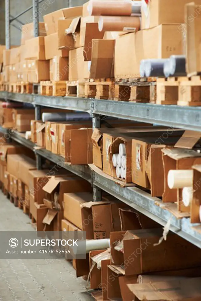 Large warehouse storage shelves with boxes packed on them
