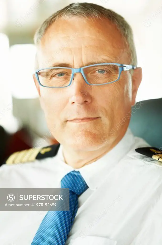 Portrait of a mature shipmaster looking content