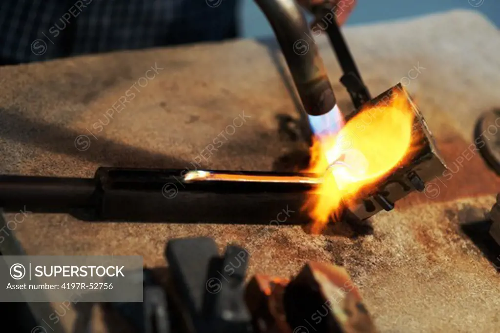Molten metal being poured in a cast