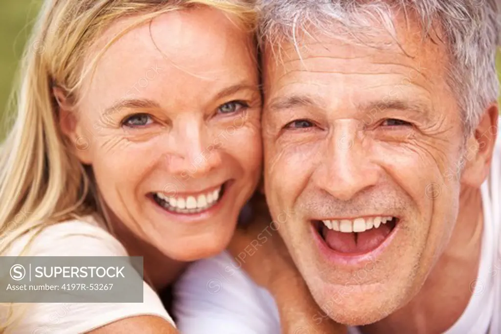 Closeup of beautiful mature couple having great time together