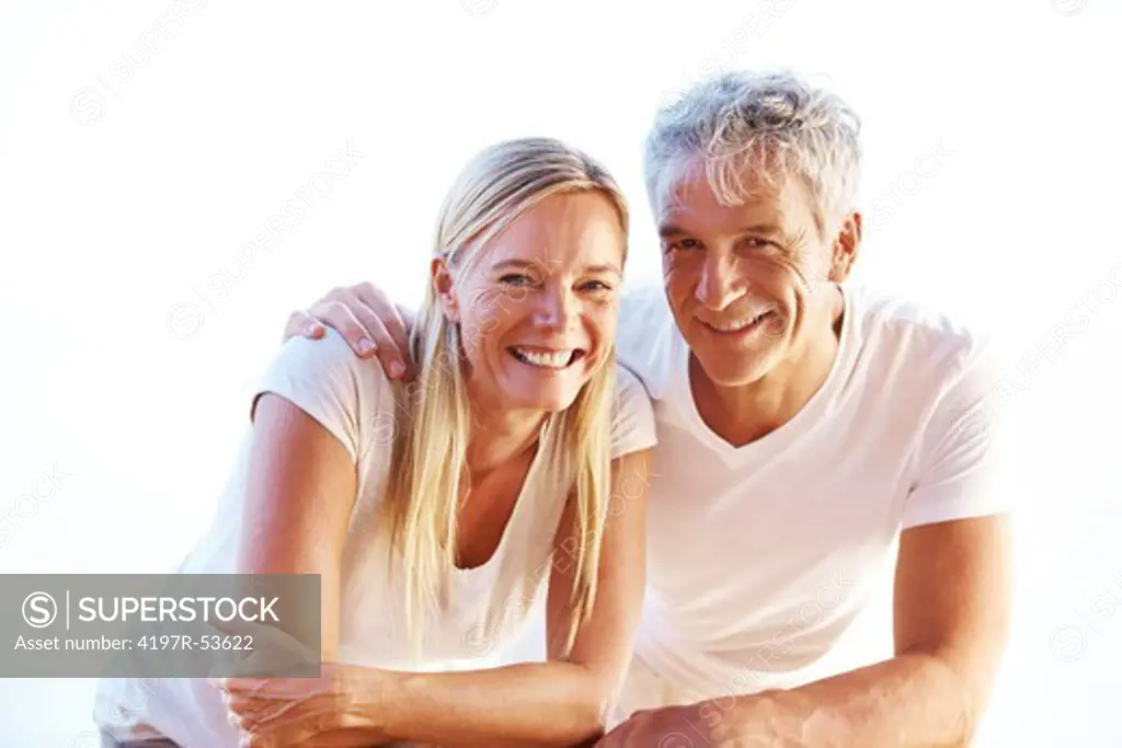 Portrait of happy mature couple together smiling