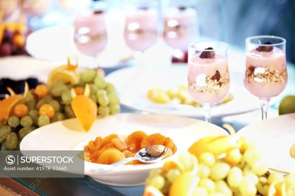 Image of buffet table with tasty dessert served in plates