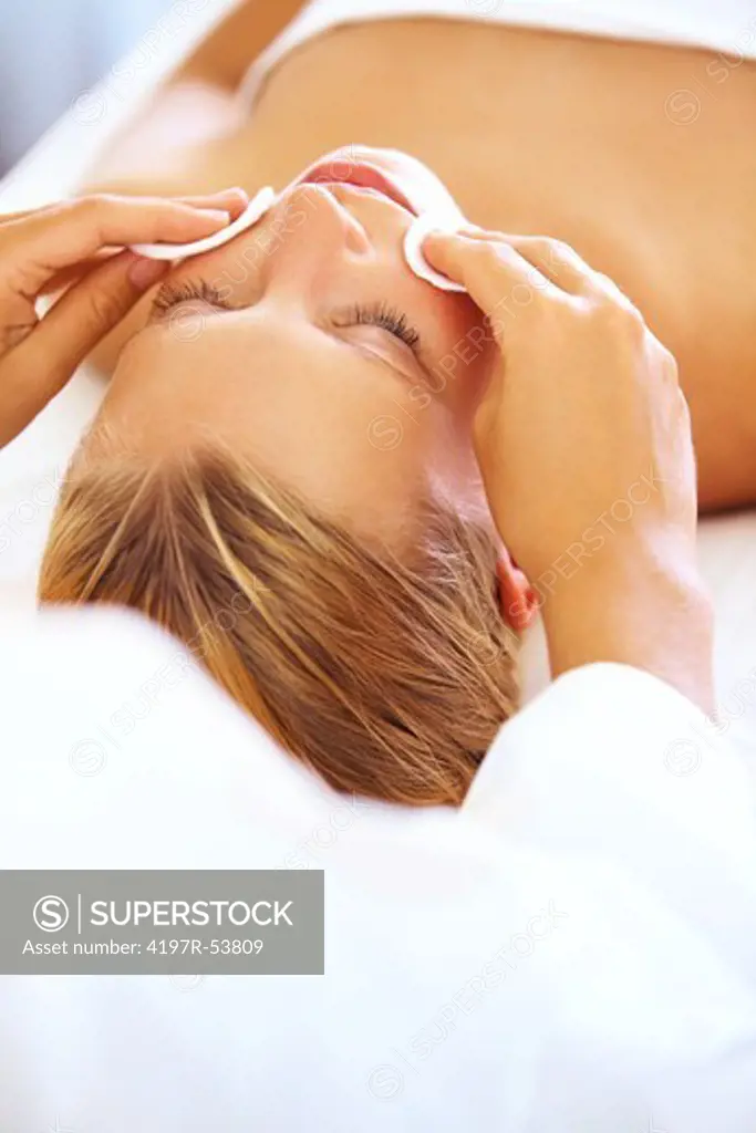 Young woman having a spa facial at the dayspa