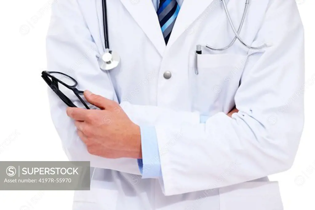 Cropped image of a young doctor holding his glasses