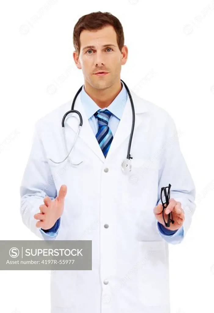 Portrait of a serious looking young doctor on a white background