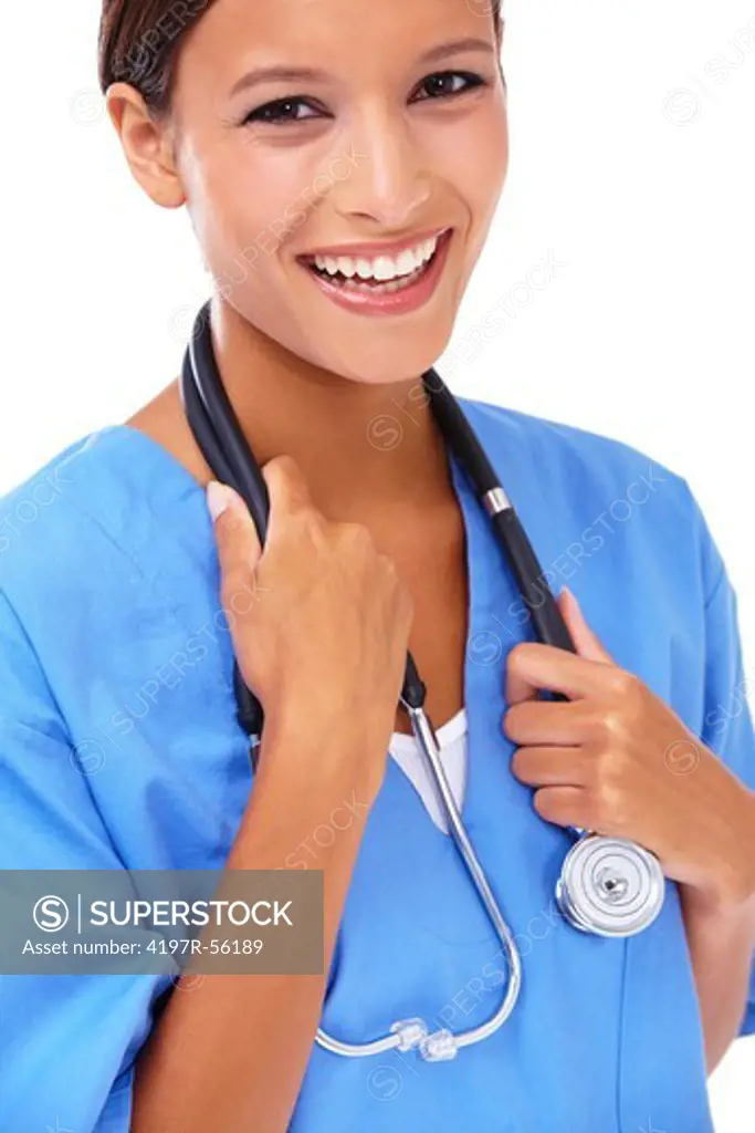Happy young doctor holding her stethoscope around her neck while isolated on white