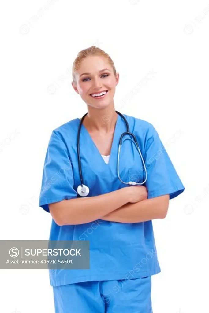 Young blonde nurse smiling at the camera with her arms folded - isolated